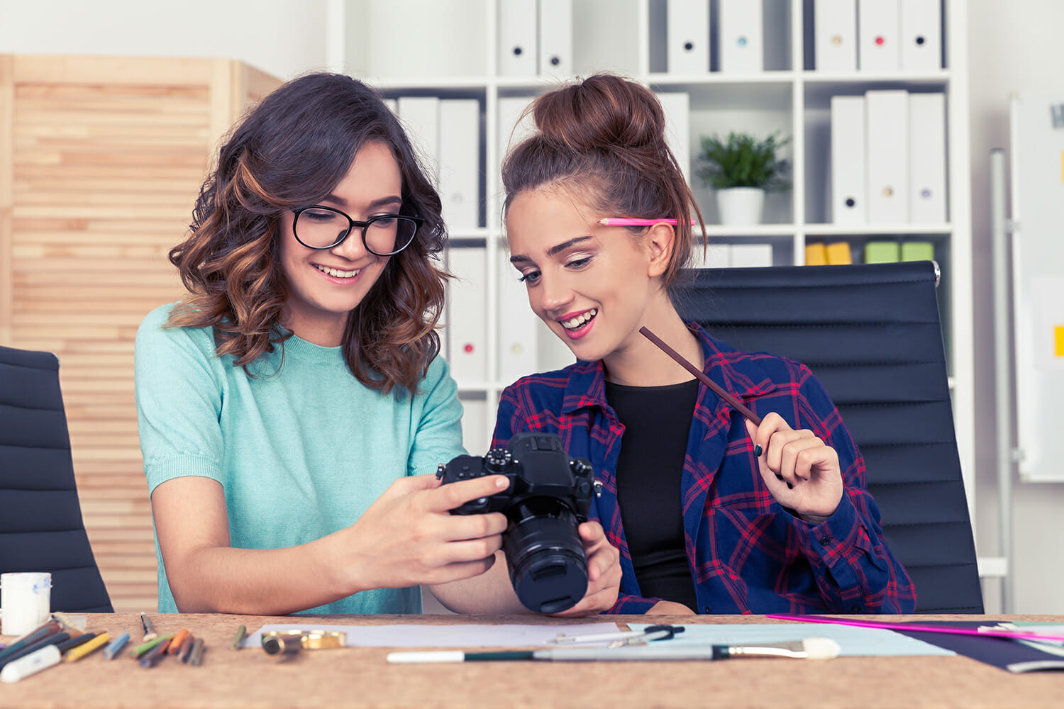 female ladies camera desk work photographers creative block