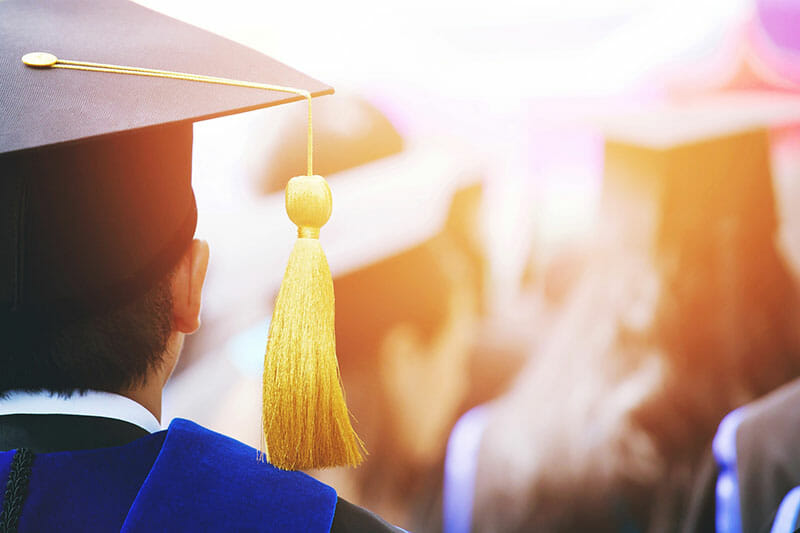 graduate college university cap matriculate yellow tassel ceremony