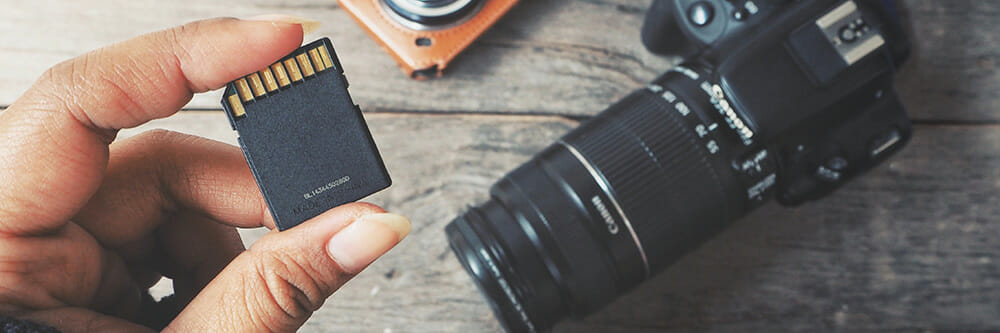 hand holding memory card camera photography