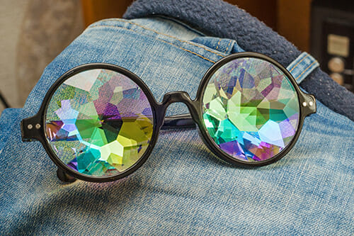 kaleidoscope glasses on jeans